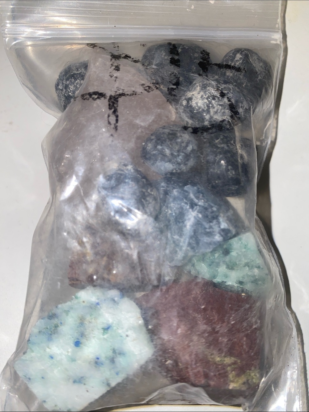 Un polished stones
